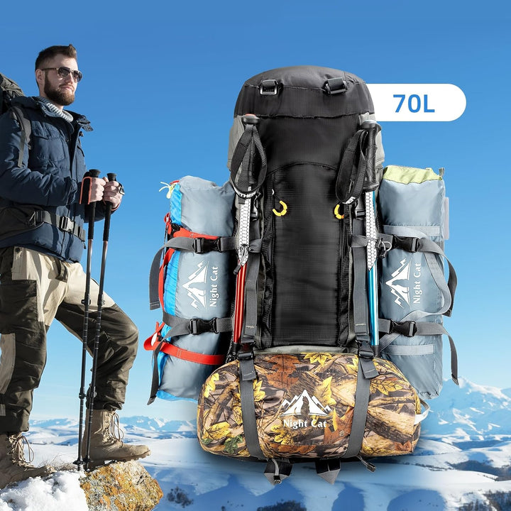 Night Cat 70L backpack with built-in frame, packed with multiple gear for hiking in snowy mountains, showcasing its large capacity and robust design for outdoor adventures.