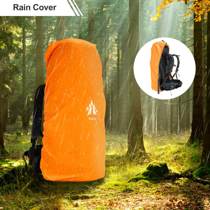 Night Cat 70L backpack fitted with an orange waterproof rain cover, providing weather protection during hiking in a forest setting.
