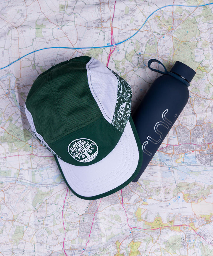 Runr Leave Nothing But Footprints running hat worn on a run