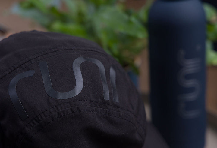 Runr Milan Blackout running hat - side view while running