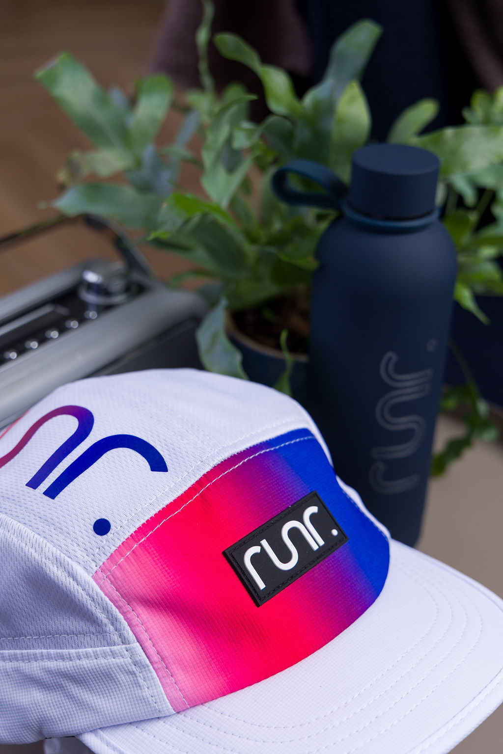 Runr San Diego running hat worn on a run