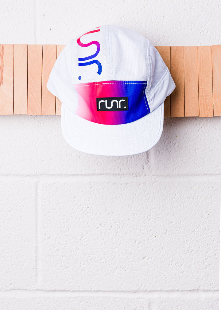 Runr San Diego running hat worn outdoors