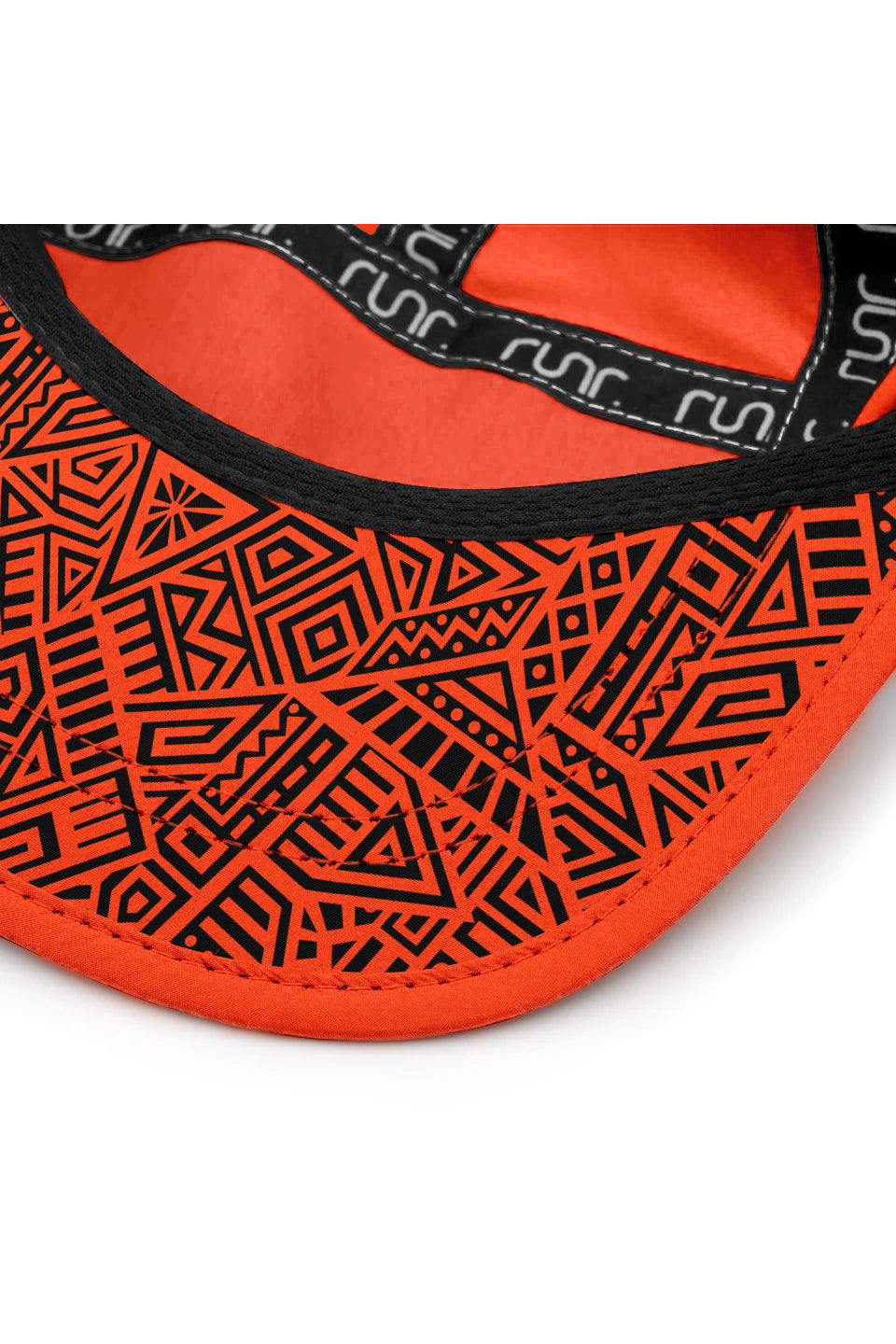 Runr Lumos reflective running hat in midnight orange - under-peak view