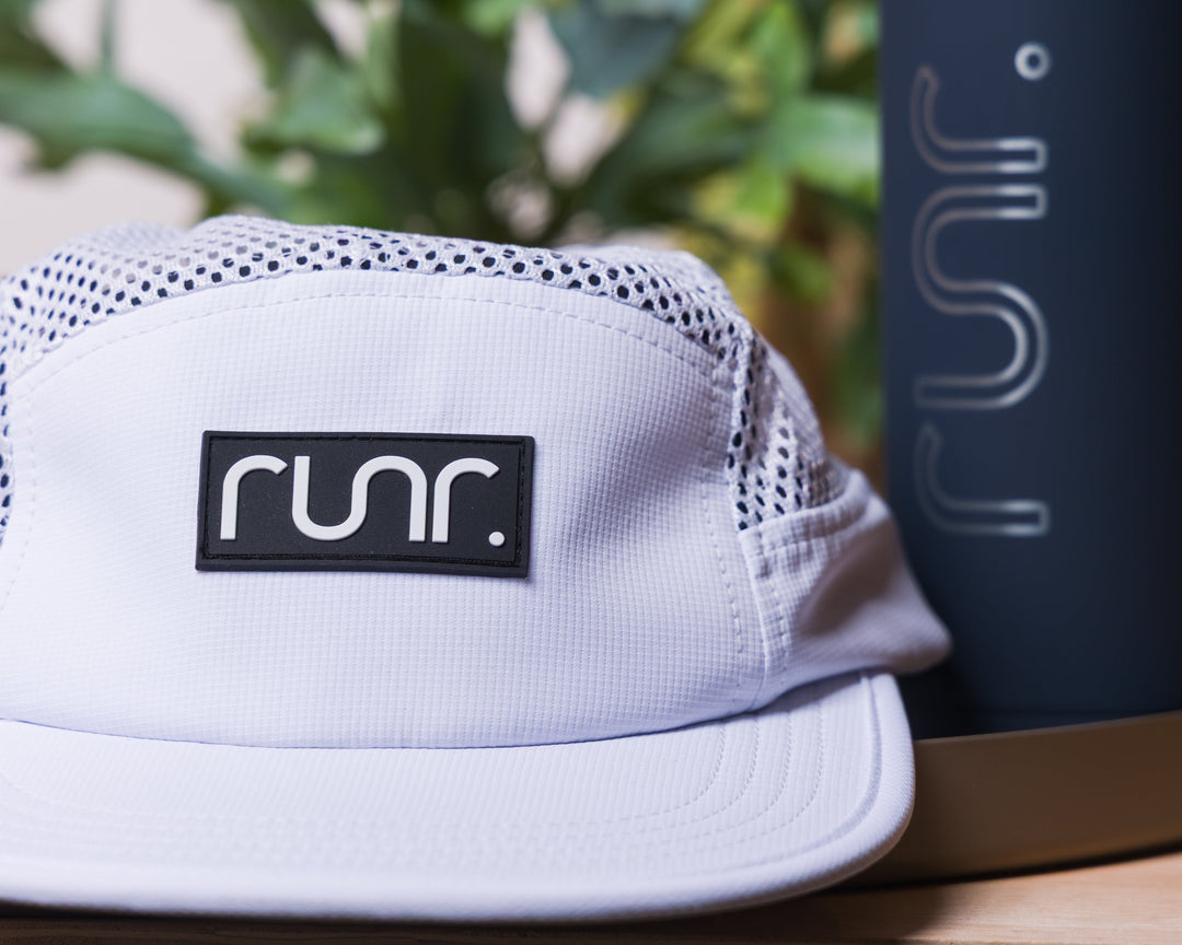 Runr Bali Airflow running hat worn on a run