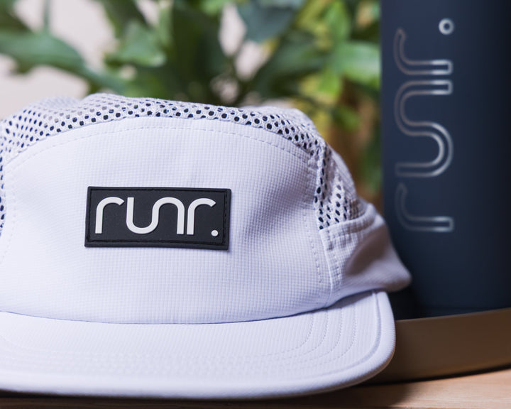 Runr Bali Airflow running hat worn on a run