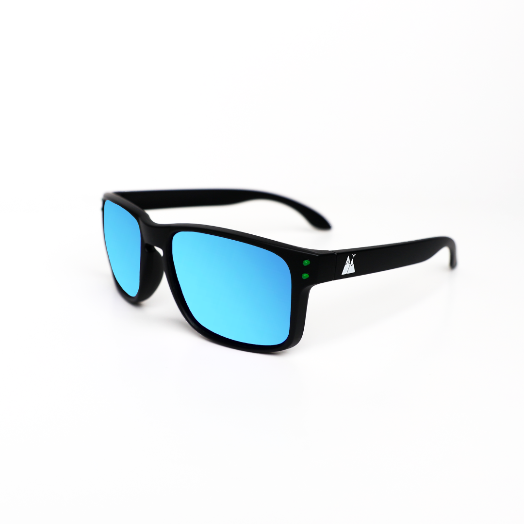 Blue polarised sunglasses with a stylish matte finish, showcasing the mountain logo on the temple and dark tinted lenses, presented on a clean white background.
