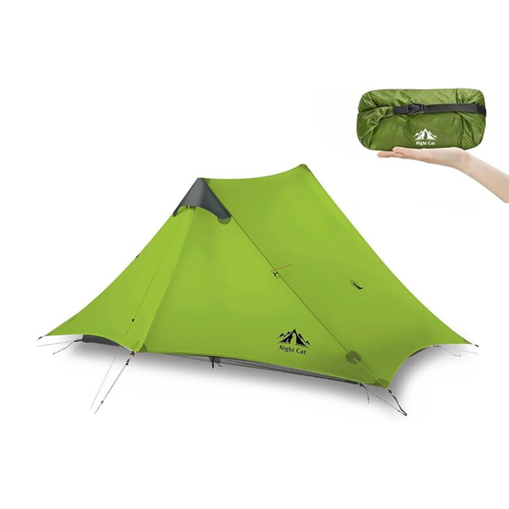 Night Cat 2 person ultralight tent in green with its compact carry bag in hand 