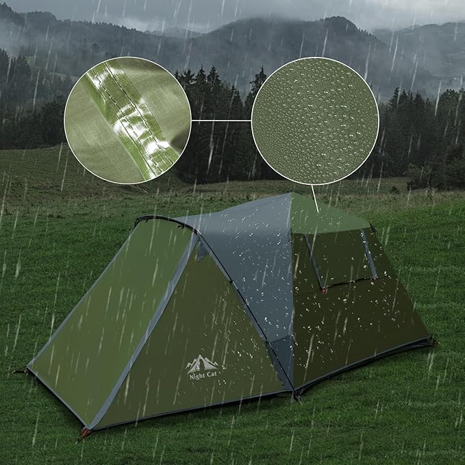 Night Cat pop-up cabin tent in heavy rain, with water beading on the waterproof fabric