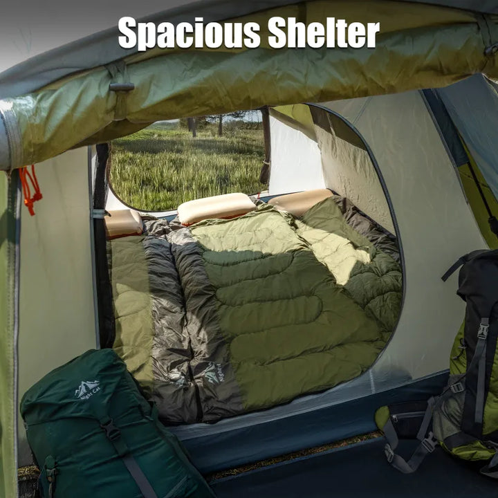 Inside the Night Cat pop-up cabin tent with two sleeping bags and a rucksack