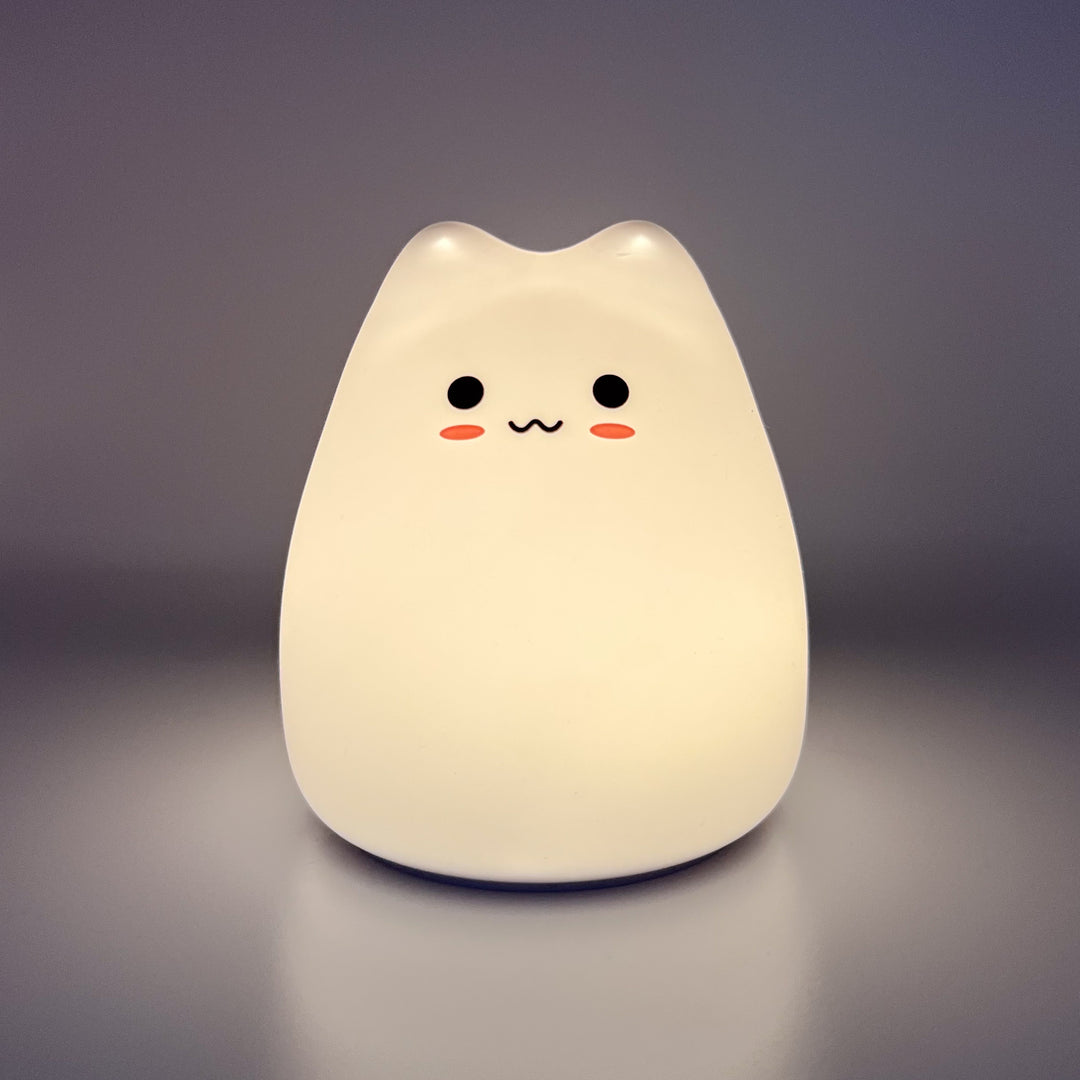Silicone cat night light glowing warm white