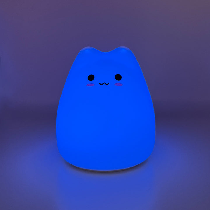 Silicone cat night light glowing blue