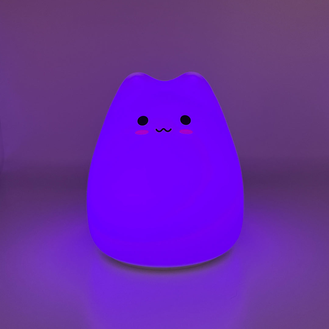 Silicone cat night light glowing purple